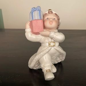 Lenox porcelain figurine Child Holding Christmas Presents